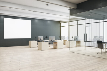 Blank white poster on black wall in spacious office hall with modern eco furniture, wooden floor and meeting room with glass walls. Mockup