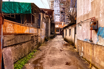 Fototapeta na wymiar The courtyard of a poor house in the ghetto