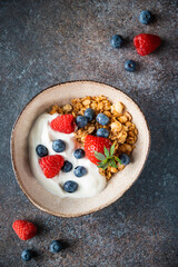 Healthy breakfast, cereal with berries and yogurt