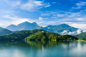 Naklejka na ściany i meble The scenery of Sun Moon Lake in the morning is a famous attraction in Nantou, Taiwan.