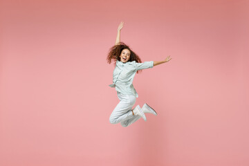 Full length young black african fun expressive overjoyed joyful smiling energetic excited woman 20s...