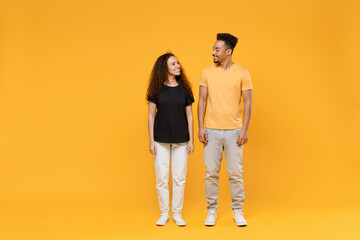 Full length young couple two fun american friends family cool happy fun smiling cheerful african...