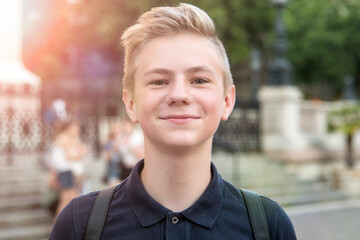 Portrait of a beautiful teenage boy. Close up photo. Young student have fun. Lifestyle photo.