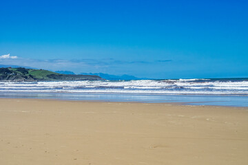 Beautiful landscape with beach in San Vincente de la Barquera in Spain. Bay of Biscay.