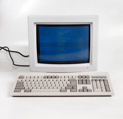 Computer from the nineties. PC. Vintage. Keyboard and monitor. Microsoft. DOS system. Personal...