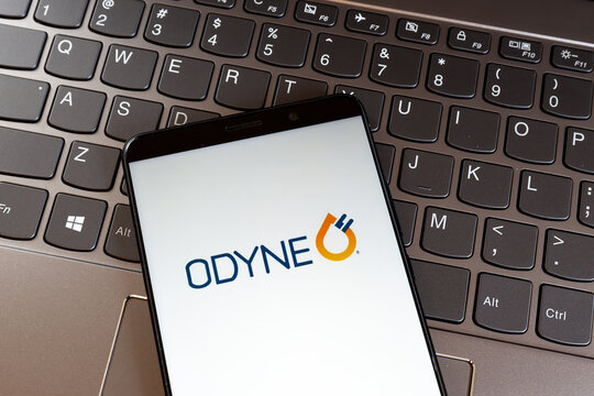  Toronto, Canada - March 18, 2021: Odyne logo on smartphone screen on keyboard. Odyne Corporation develops and manufactures propulsion systems for hybrid electric vehicles. 