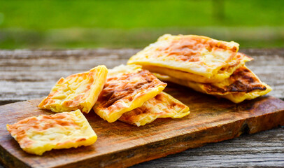 Fresh baked home made  cheese puff pastries.Cheese pie with phyllo pastry and  white cheese.