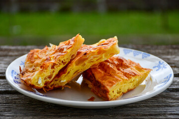 Fresh baked home made  cheese puff pastries.Cheese pie with phyllo pastry and  white cheese.