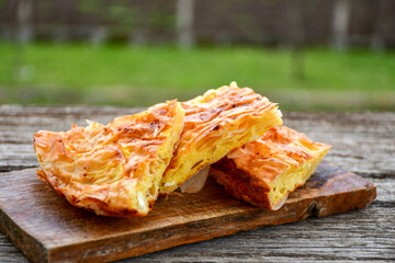 Fresh baked home made  cheese puff pastries.Cheese pie with phyllo pastry and  white cheese.