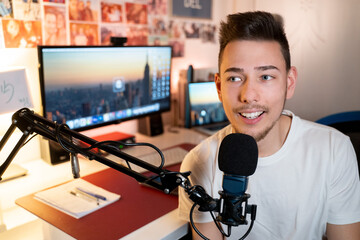Young man recording podcast or voiceover 