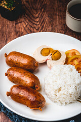 Pinoy Breakfast Meal- Longganisa with Salted Egg and Steamed Rice (vertical center)