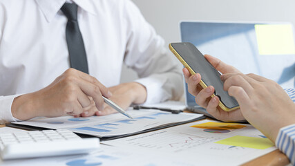 Brainstorming of business people, Businessmen are meeting a marketing team and come up with profitable strategies for the growth of the company, Finding ways to make financial profits.