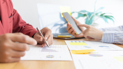 Brainstorming of business people, Businessmen are meeting a marketing team and come up with profitable strategies for the growth of the company, Finding ways to make financial profits.