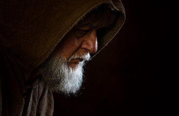 Medieval old face of a monk - obrazy, fototapety, plakaty