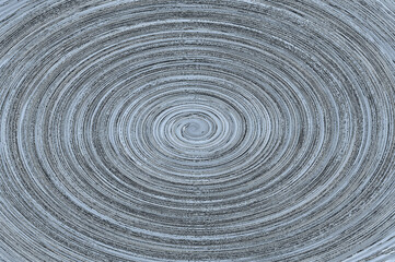 Abstract spiral vertical gray textured. Empty background.