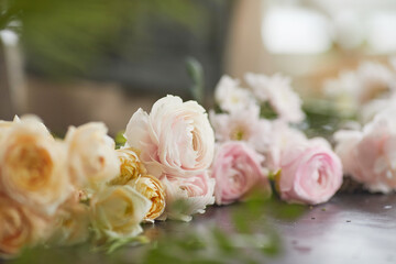 Extreme close up of beautiful flowers arranged on table in florists workshop, copy space