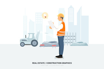 A construction worker looking at a blueprint / paper