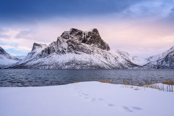 Fototapeta na wymiar mountains with a fjord near the village of Fylkesvei