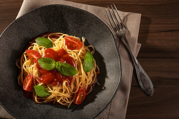 Rustic pasta dish with tomatoes and basil