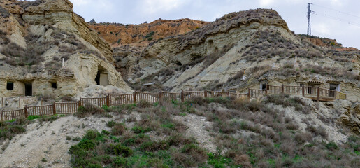 view of the caves of Arguedas and the homes in the sandstone cliffs