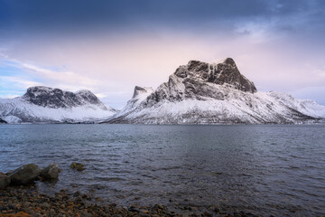 Fototapeta na wymiar mountains with a fjord near the village of Fylkesvei