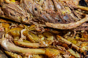 leavings and bones of a baked duck close-up