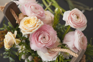 Close up of beautiful flower composition with pink peonies and roses, background image, copy space