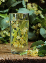 linden broth in a glass on the table.