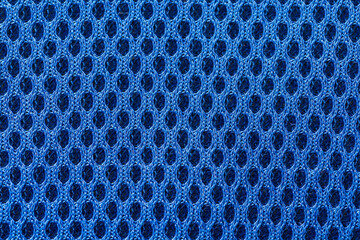 Close up shot of blue mesh fabric textile texture