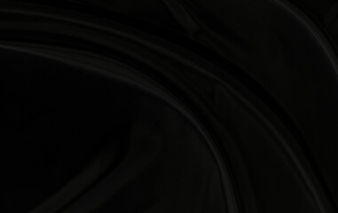 Black gray satin dark fabric texture luxurious shiny that is abstract silk cloth background with patterns soft waves blur beautiful.