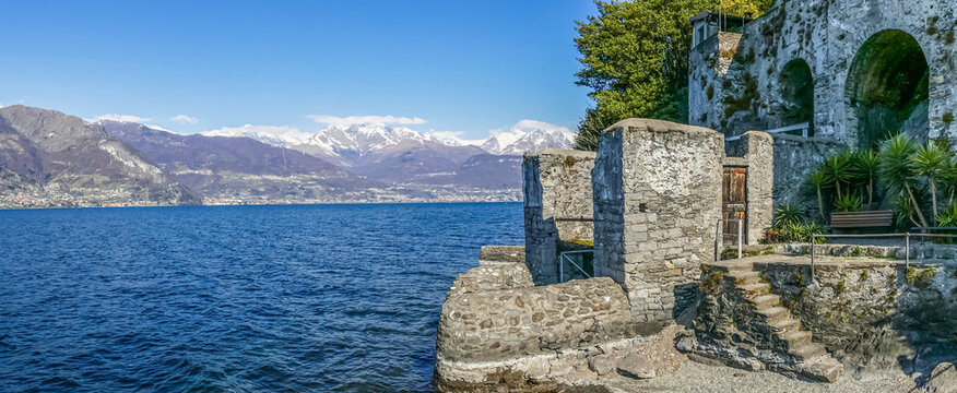 Extra wide view of the Lake of Como from the beach of Corenno