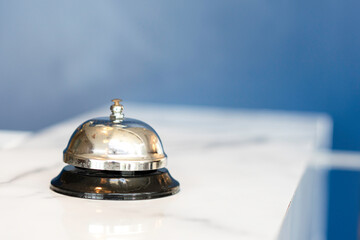 Hotel ring bell on counter desk at front reception 
