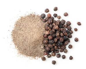 Black peppercorns and ground black pepper on a white background, isolated. Top view