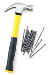 Hammer and pile of metal nails on white background, isolated. The view from top