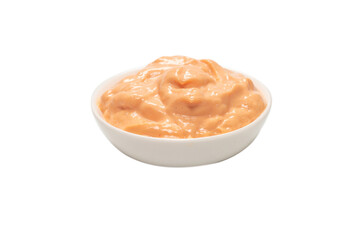 Sauce in a bowl isolated on white.