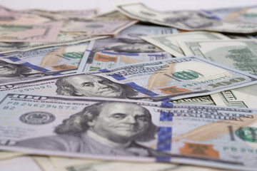 Bundle of dollars on the table close-up - texture, background