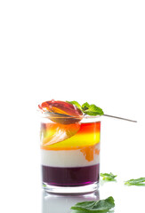 lot of colored sweet fruit jelly in a glass