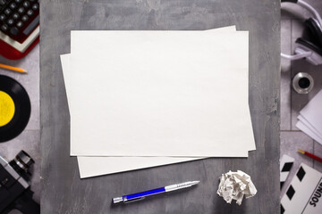 Empty sheet of paper and pen with creative design. Movie and screenwriter or composer concept