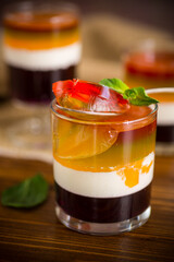 lot of colored sweet fruit jelly in a glass