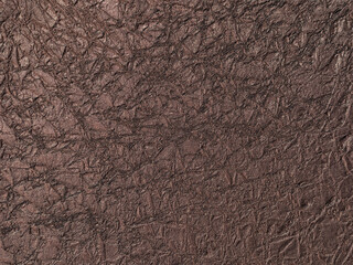Bronze, brown textured paper for design and background.