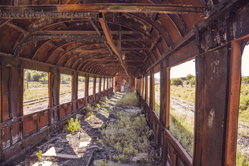 Old rusty railway carriage inside 