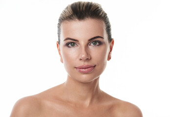 Beauty portrait of attractive half naked caucasian woman with perfect clean and healthy skin, isolated on white background with copy space