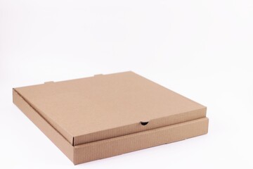 Brown pizza big size cardboard box isolated on white