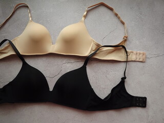 lots of bras in different shapes and colors close up. High quality photo