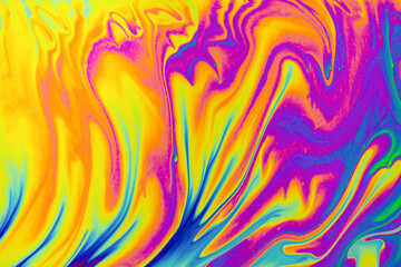 Psychedelic multicolor patterns background. Photo macro shot of soap bubbles