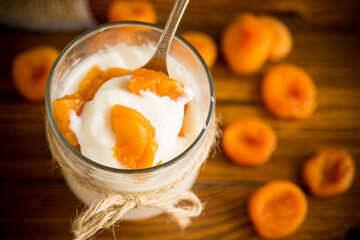 homemade sweet yogurt in a glass with dried apricots