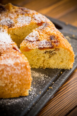 cooked sweet biscuit with dried apricots and nuts inside