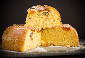 cooked sweet biscuit with dried apricots and nuts inside