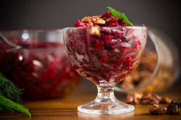 dietary salad of boiled beets with walnuts