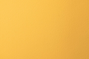 Textura de pared pintada de amarillo